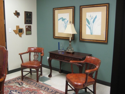 5 Star Dental Group seating area with award plaques on the wall