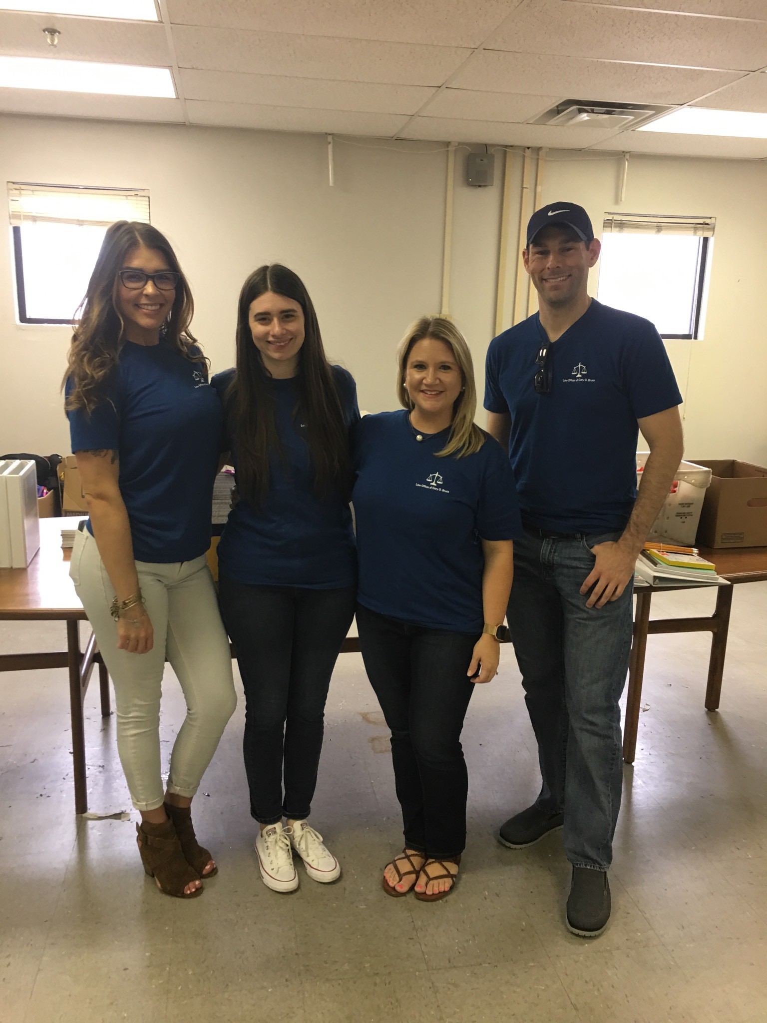 The Law Offices of Gary Bruce Volunteering With United Way's Stuff the Bus in Columbus, GA
