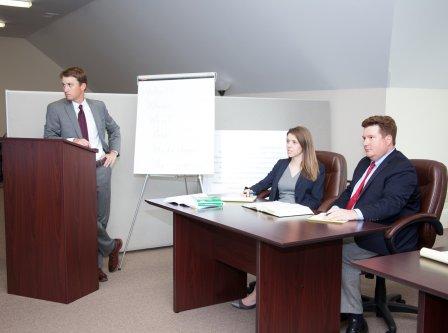 attorneys Robert Varner, Kristen Campbell and Mitchell Ladson in mock trial