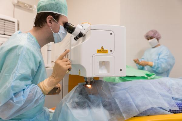 eye surgeon performing LASIK