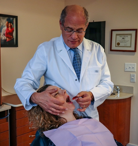 Dr. Shapira fitting a patient with oral appliance for sleep apnea