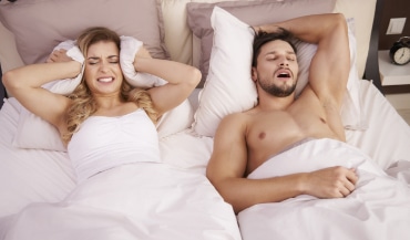 Older man with arms crossed