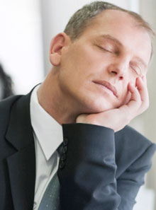 man falling asleep during the day due to obstructive sleep apnea