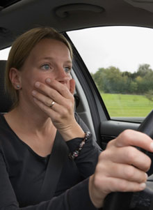 woman nearly crashes car due to drowsy driving