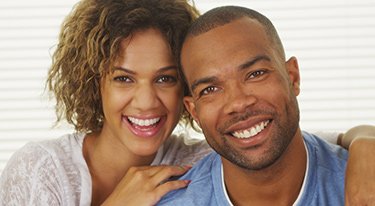 Young Couple with Big, Bright Smiles and Healthy Teeth