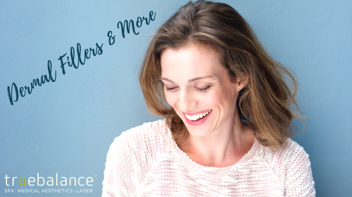 Middle Aged Woman Smiling Before Dermal Filler Treatment